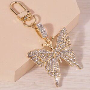 Bag Charm, buttterfly, rhinestones in gold tone. NWT!
